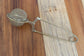 Gold tea ball infuser for brewing loose leaf tea